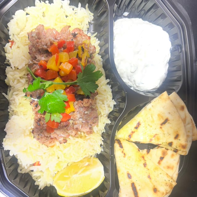 Greek Loukaniko Over Rice.